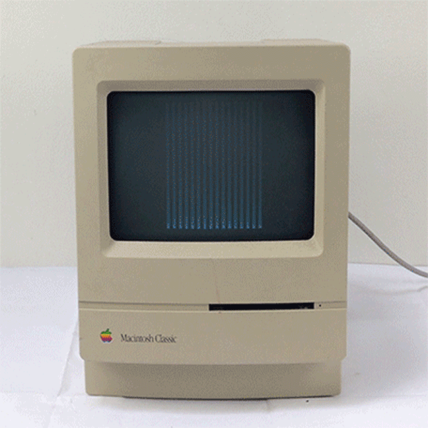 A GIF of a Macintosh Classic with a glitching screen.